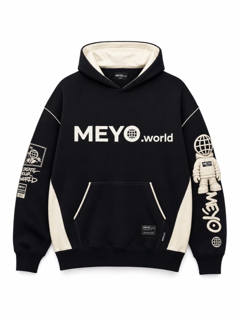 A black oversized MEYO hoodie with cream panels and a figure printed on the sleeve